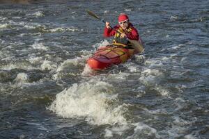 paddling whitewater kayak photo