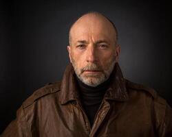 headshot of man in leather jacket photo