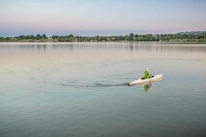 evening canoe paddling in Colorado photo