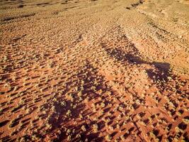 desert aerial view at sunrise photo