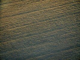 plowed field aerial view photo