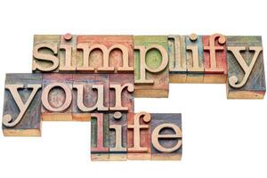 simplify your life - word asbtract in wood type photo