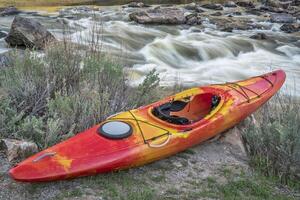 whitewater kayak and river rapid photo