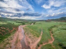 mountain valley with creek in Colorado photo