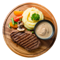 speciaal rundvlees steak schotel met vers salade, gepureerd aardappelen geserveerd Aan een houten bord png