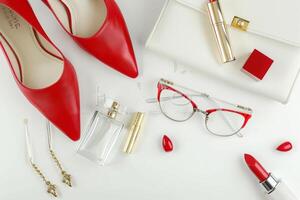 Chic fashion ensemble featuring red heels and stylish accessories for a modern beauty blog photo