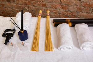 Beautiful spa composition on massage table in wellness center photo