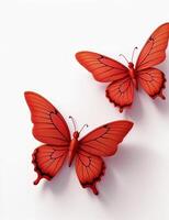 dos rojo mariposas en un blanco antecedentes foto