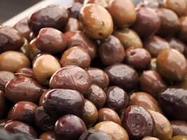 olives in the local market in Ortigia island in province of Syracuse in Sicily photo