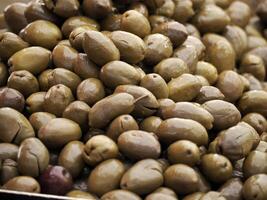 olives in the local market in Ortigia island in province of Syracuse in Sicily photo