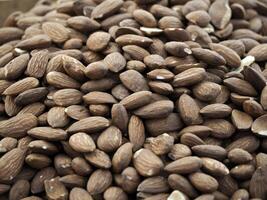 Almond in the local market in Ortigia island in province of Syracuse in Sicily photo