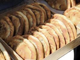 Panzerotti stuffed pasta street food at syracuse market photo