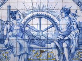 blue ceramic tiles on Old town building in Aveiro pictoresque village street view, The Venice Of Portugal photo