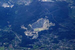 Quarry cave pit Aerial view from airplane, Portugal photo