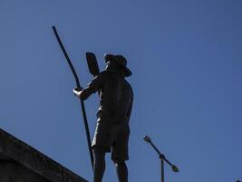 sculpture on main bridge of Aveiro pictoresque village street view, The Venice Of Portugal photo