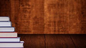 World book day. Stack of colorful books with open book on teal background. Education photo