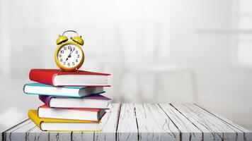 World book day. Stack of colorful books with open book on teal background. Education photo