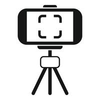Black and white icon depicting a smartphone mounted on a tripod vector