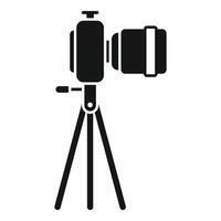 Professional camera on tripod silhouette vector