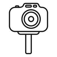 Black and white icon of a camera on a stick vector