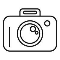 Outline icon of a digital camera vector