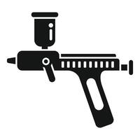 negro silueta de un calafateo pistola icono vector