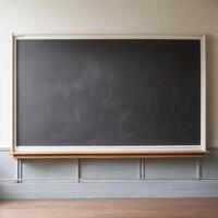 Plain black whiteboard in the classroom photo