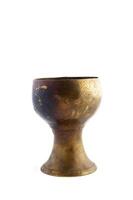 Ancient style wine goblet with golden rim photo