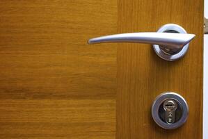 Wooden door with the lock photo