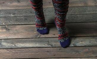 Color socks on a wooden floor photo