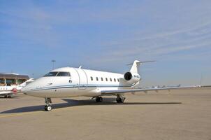 business plane parked at the airport photo