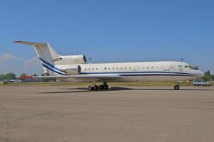 business plane parked at the airport photo