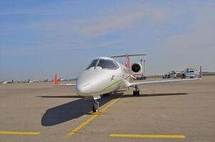 business plane parked at the airport photo