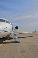 business plane parked at the airport photo