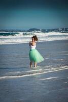 hermosa niña posando en el playa. oro costa, Australia, Queensland foto