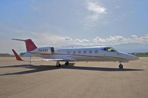 business plane parked at the airport photo