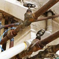 Old pipes in a basement photo