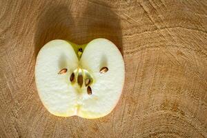 Fresh red apples on a wooden background photo