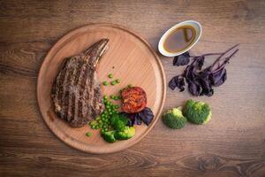 Steak on serving plate photo