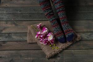 Color socks on a wooden floor photo