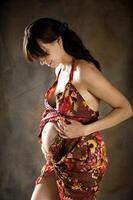 The beautiful young girl, the third trimester of pregnancy photo