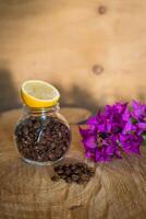 Coffee beans on a wooden table photo