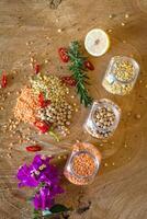 Raw cereals set on wooden background photo