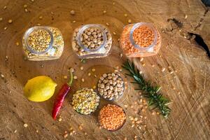 Raw cereals set on wooden background photo