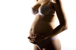 The beautiful young girl, the third trimester of pregnancy photo