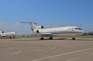 business plane parked at the airport photo