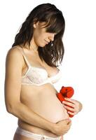 The beautiful young girl, the third trimester of pregnancy photo