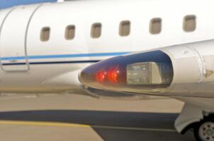 business plane parked at the airport photo