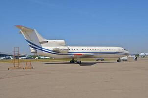 business plane parked at the airport photo