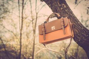 Fashion shot of a beautiful boho style girl on nature background. Boho, hippie. photo